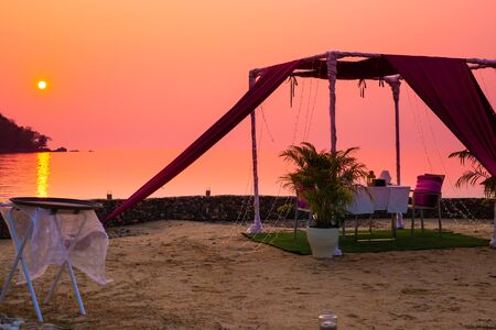 gazebo for relaxing on the beach at sunset, a romantic dinner in the privacyの写真素材