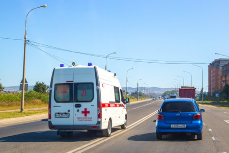 Anapa, Russia - 08.05.20: ambulance car drives in the oncoming lane on the road in Russia. Road emergency, emergencyのeditorial素材