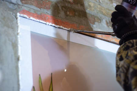 installation of a matte interior window, foaming the gaps with polyurethane foam. Construction and...