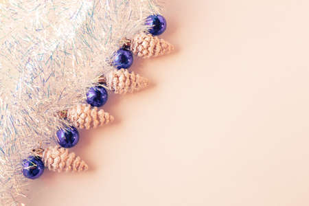 Christmas composition.Christmas decorations in blue and gold on a beige background. Flat lay, top view, copy space.の写真素材