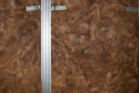 Insulation and sound insulation of walls with mineral wool, before facing with plasterboard. Home...