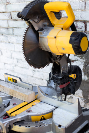 Circular saw with a sharp saw. Making furniture with a professional tool.