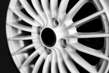 White alloy wheels for premium cars, close-up. Purchase and replacement of autodisks.の写真素材