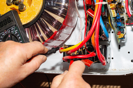 voltage stabilizer repair. Measuring the resistance of the electrical circuit of the Centurion stabilizer: Russia, Anapa-20.10.2022のeditorial素材