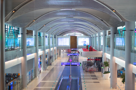 The airport building inside with signs of the directions of departure and arrival of aircraft....