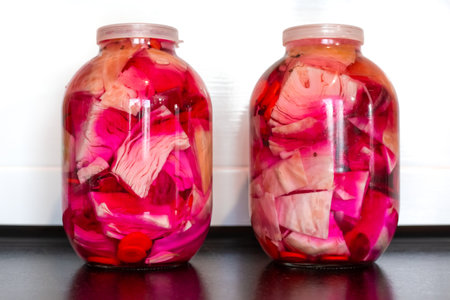 canned white cabbage with beets in glass jars. Salting and pickling cabbage.の写真素材