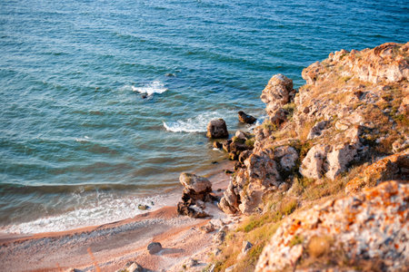 Seascape with mountains and a bay with a sandy beach, top view. Travel and tourism.の写真素材