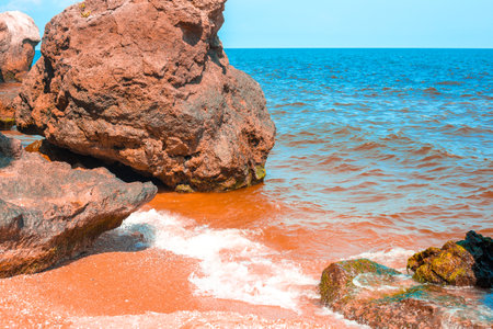 Sea bay with rocky shore on a summer day. Seascape.の写真素材