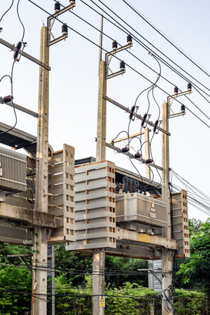 High voltage transformers with wires that convert electricity. Power engineering and construction.の写真素材