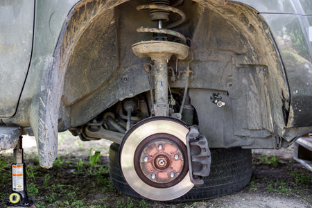 Repair of the car brake system. Removing the wheel to access the brake pads.