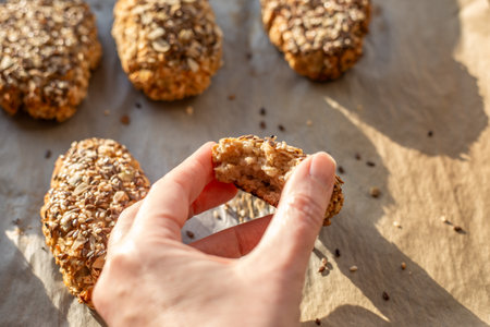 Proper healthy nutrition. Baking grain buns with oatmeal, flax, sunflower and sesame seeds.