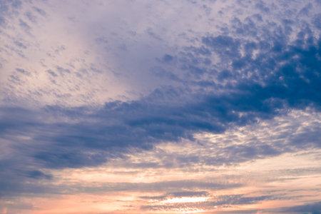 Sunset cloudy sky with beautiful color gradient. Cloud landscape, background.