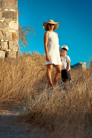 Mother and her cute little son walking outdoorsの写真素材