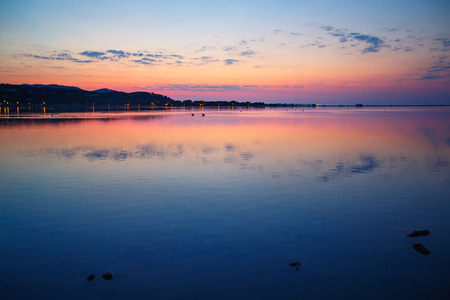 Beautiful sunset over water on Sardinia island, Europeの写真素材