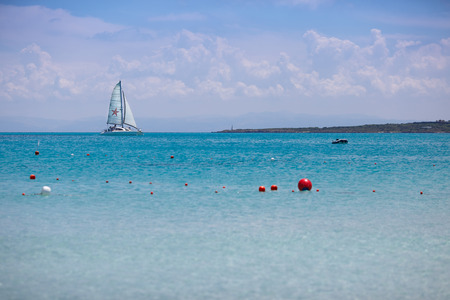 Beautiful sea view with white yacht, Sardinia, Italyの写真素材