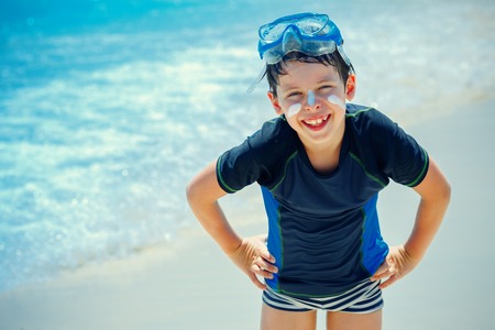 Cute little boy having fun on thai beach, Koh Phangan island, Thailand, Asiaの写真素材