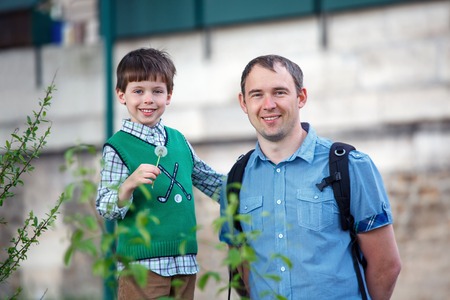 Portrait of happy father and son outdoorの写真素材