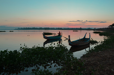 Beautiful old wooden boats, near teak bridge U-BEIN. Mandalayの写真素材