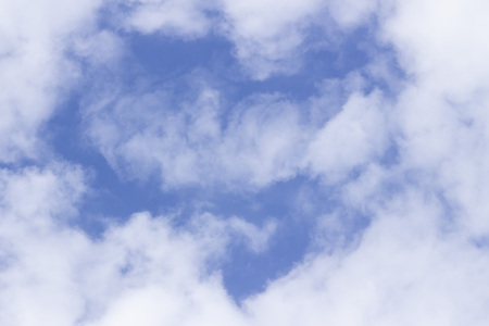 light white clouds in the sky in the shape of a heart a mystery of natureの写真素材