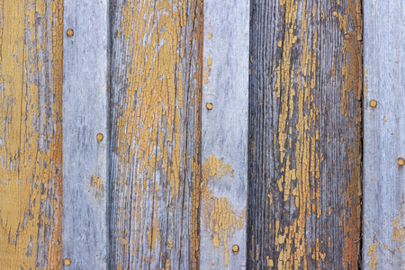 copyspace background texture wooden boards with peeling paint orangeの写真素材