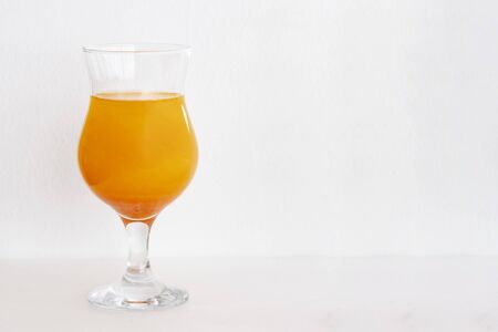 cocktails orange with glitter on a white background. copy space, space for textの写真素材
