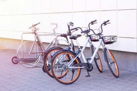 bike with gps navigator in the parking lot, the theme of transport and communications. there are...