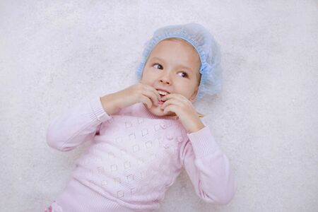 child in salt room. Halotherapy for treatment of respiratory diseases. Applying salt therapy in the Spaの写真素材