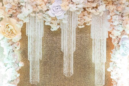 Gentle design of the photo zone from large flowers from foamiran, beige delicate colors, goldenの素材 [FY310135223896]