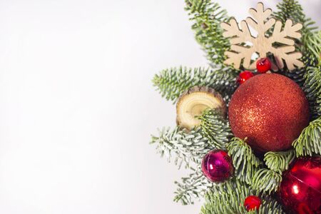 Christmas composition. Christmas decorations, fir branches on a white background. New Year. copy spaceの写真素材