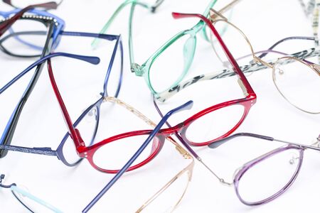 Background from modern fashionable female glasses for sight. on a light background.