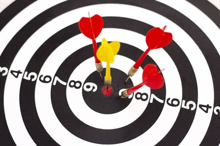 Right to Target Concept Using Darts in Bulseye on Darts Business Success Concept. destruction of...
