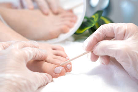 therapeutic pedicure with a stick for nails. Clinic of Podiatry Podiatry.の写真素材