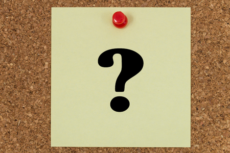 Question mark written on a note