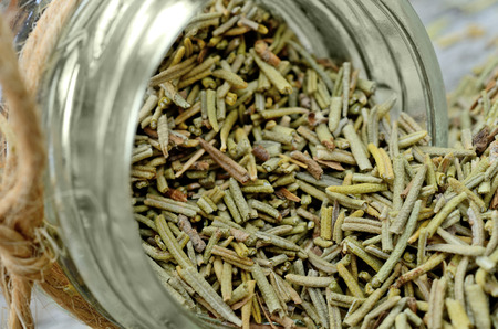 dried rosemary on wooden tableの写真素材