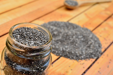 chia seed in jar on wooden tableの写真素材