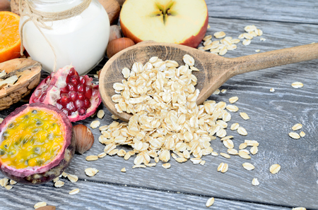 oat cereal on gray wooden tableの写真素材