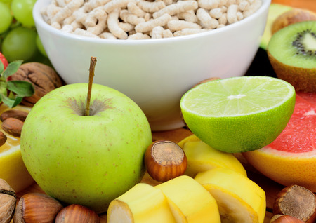 cereal with fruit on wooden table