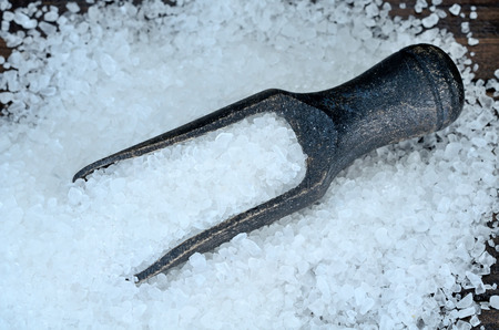 white salt on wooden table