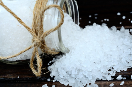 white salt on wooden table