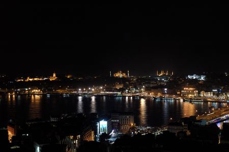 The topkapi palace hagia sophia blue mosque and golden horn creek at night in istanbul Turkey.の写真素材