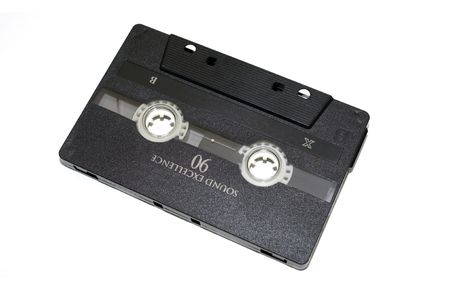 old audio tape on white backgroundの写真素材