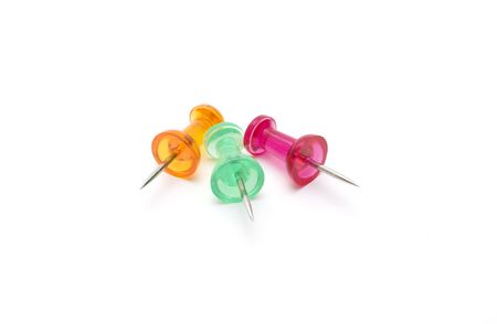 Different color drawing-pins on white backgroundの写真素材