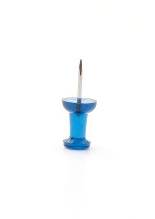 Blue drawing-pins on white backgroundの写真素材