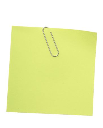 green reminder note with paper clipの写真素材