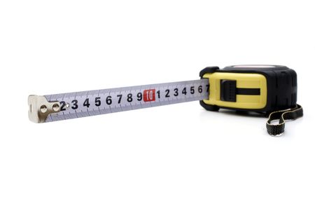Opened tape measure on white isolated background の写真素材