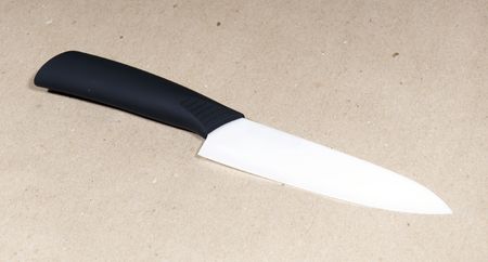 White ceramic knife on draft paper backgroundの写真素材