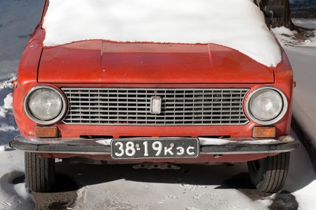 Abakan, Russia - March 20, 2011: Old car with old registration number in Abakan, the capital city of the Republic of Khakassia in Siberia, Russiaのeditorial素材