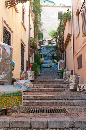 Taormina, Italy - May 1, 2011: Art corner at Corso Umberto in Taormina, Sicily, Italyのeditorial素材
