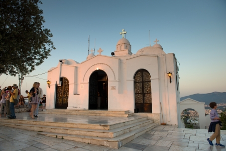 ATHENS, GREECE - May 5: Aghios Georgios Church at sunset on Lycabettus Hill against a blue sky on May 5, 2013 in Athens. Greeceのeditorial素材