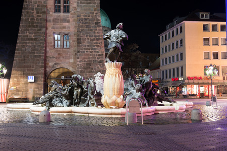 NUREMBERG, GERMANY - JAN, 3: View Marriage Merry-go-round Fountain at the Ludwigsplatz at night in Nuremberg, Germany at January 3, 2014のeditorial素材